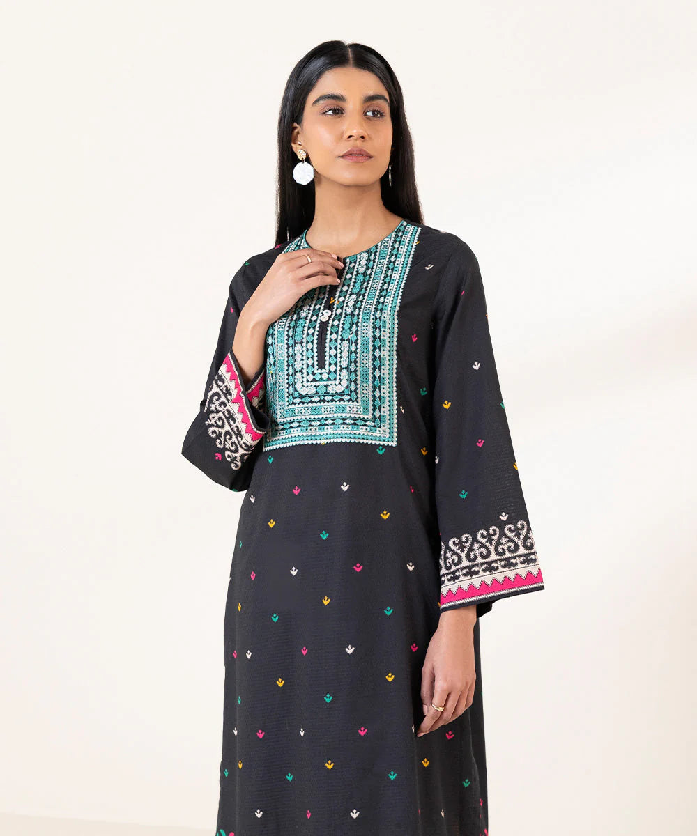 Shop Pakistani suits in Canada with this elegant black embroidered dobby shirt from Sapphire, featuring intricate craftsmanship.