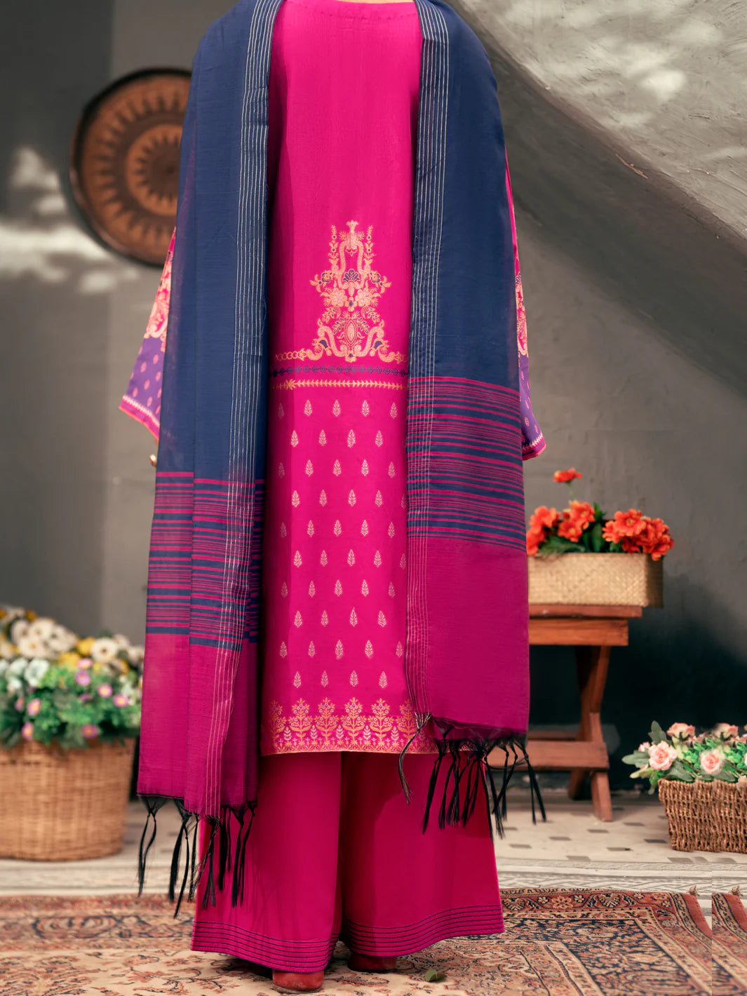 Rear view of the pink jacquard suit by Almirah, highlighting its elegant design – a top pick for Pakistani suits online in Canada.