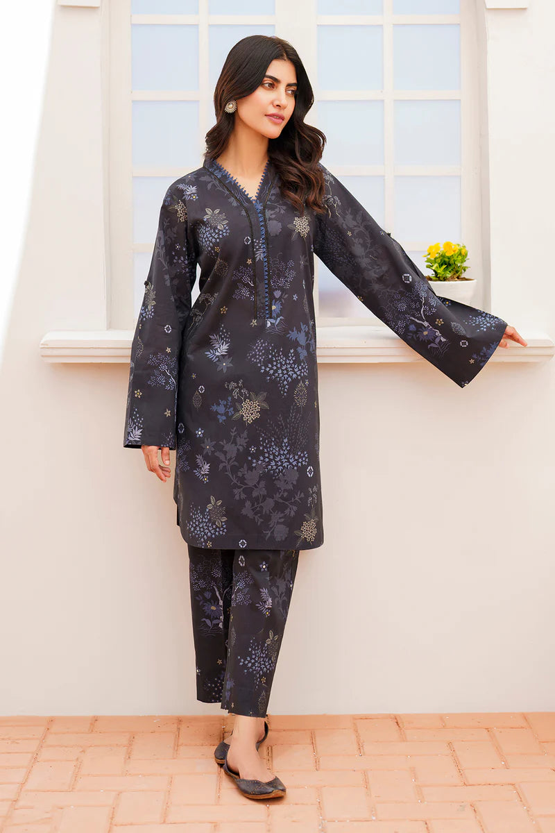 a women wearing Stylish Baroque printed lawn suit in black olive, ideal for Punjabi dresses in Canada.