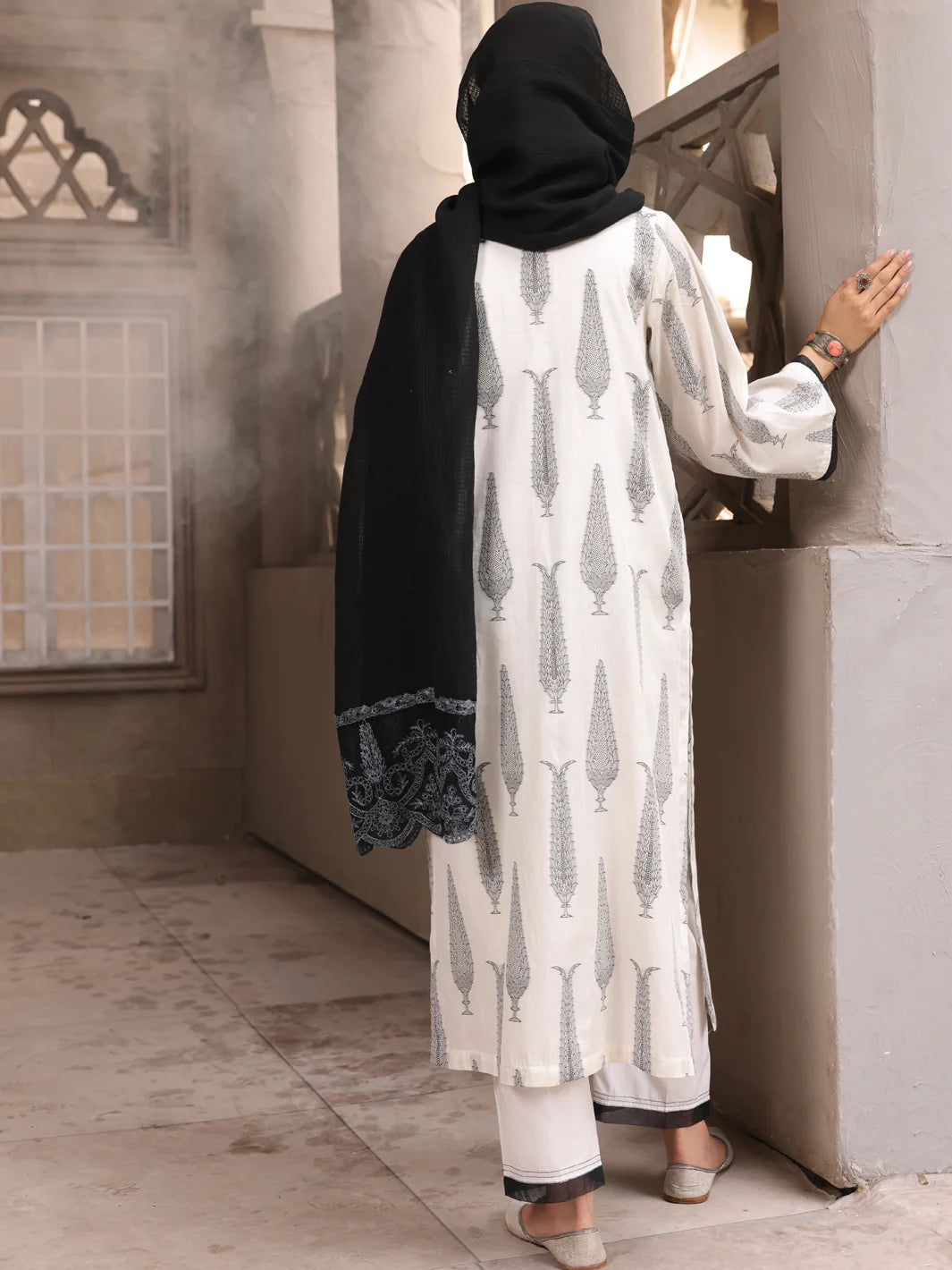 Rear view of Almirah’s elegant jacquard suit, a perfect Pakistani suit for festive and cultural events in Canada.