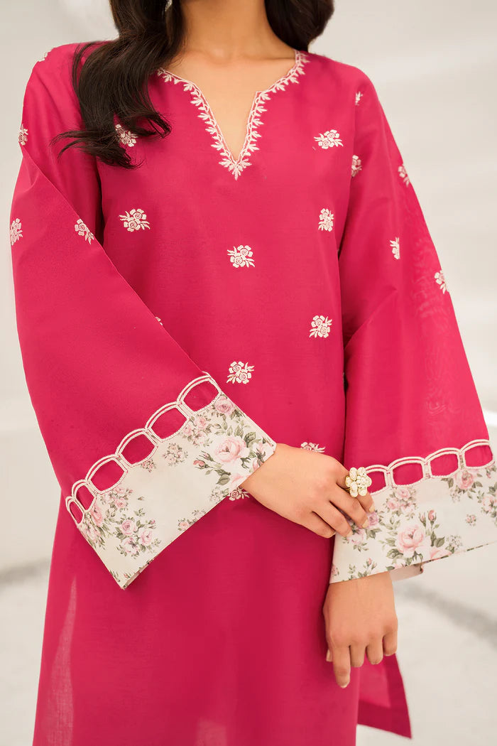 Close-up of Baroque’s exquisite embroidery on a barbie pink lawn suit – premium Pakistani suits in Canada for everyday elegance.