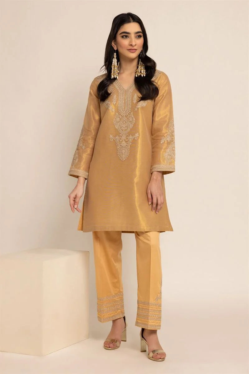 front View of a women wearing gold kurta by Khaadi, perfect for Punjabi suits lovers.