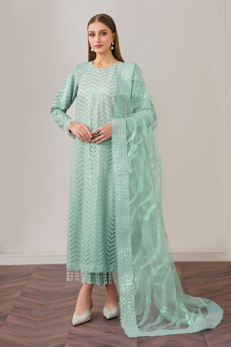 FRONT profile of Baroque’s embroidered net suit in sea green, showcasing delicate embroidery and rich silk trousers.