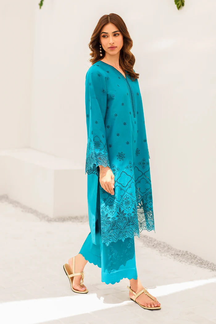 Side profile of Baroque’s sea green embroidered suit, showcasing intricate schiffli embroidery – a premium option for Punjabi suits in Canada.