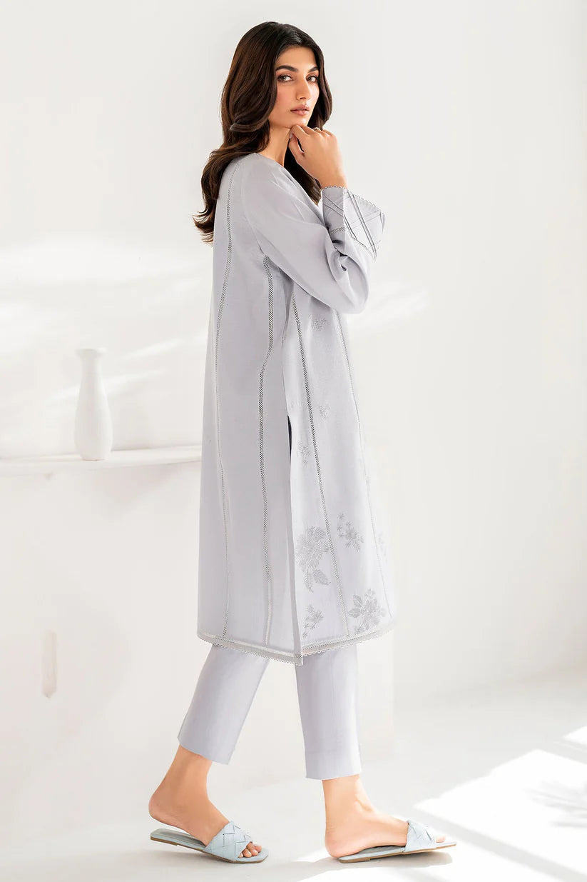 Side profile of Jazmin’s grey embroidered suit, showcasing detailed embroidery – a premium Punjabi suit in Canada.