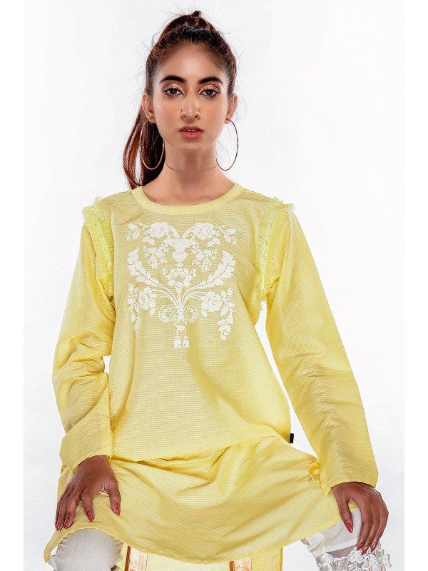 A woman wearing Ego’s elegant yellow textured cotton kurta – a premium choice for Pakistani suits online in Canada.