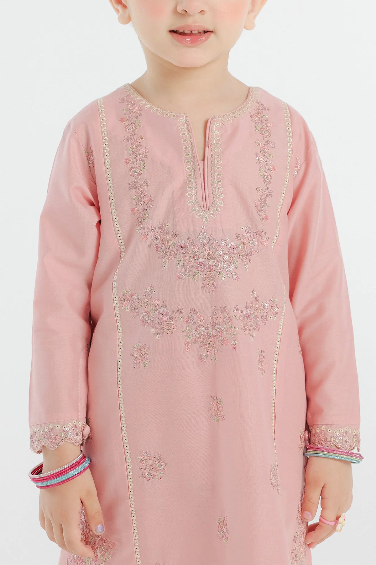 Detailed closeup of embroidery of Ethnic’s powder pink embroidered suit – a premium choice for kids' Pakistani suits.