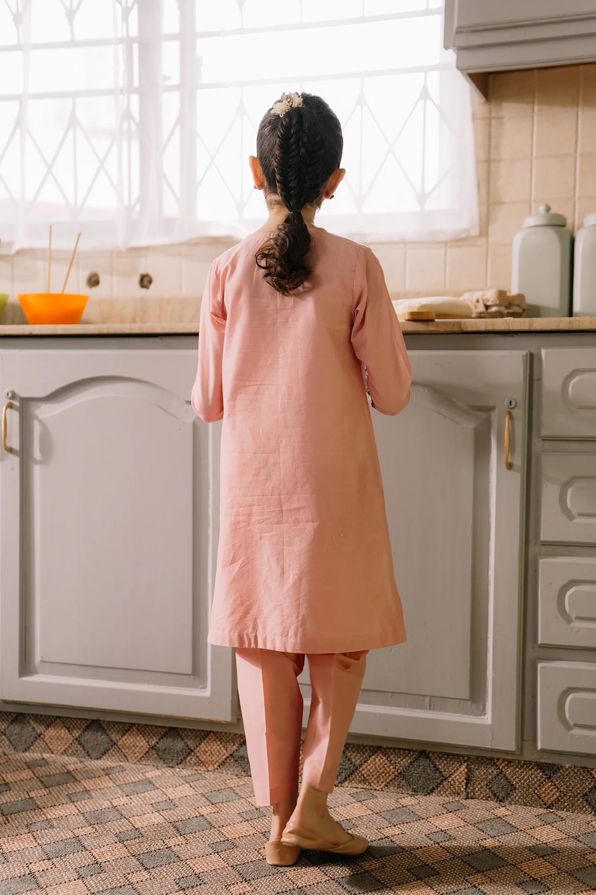 rear back embroidery of Ethnic’s powder pink embroidered suit – a premium choice for kids' Pakistani suits.