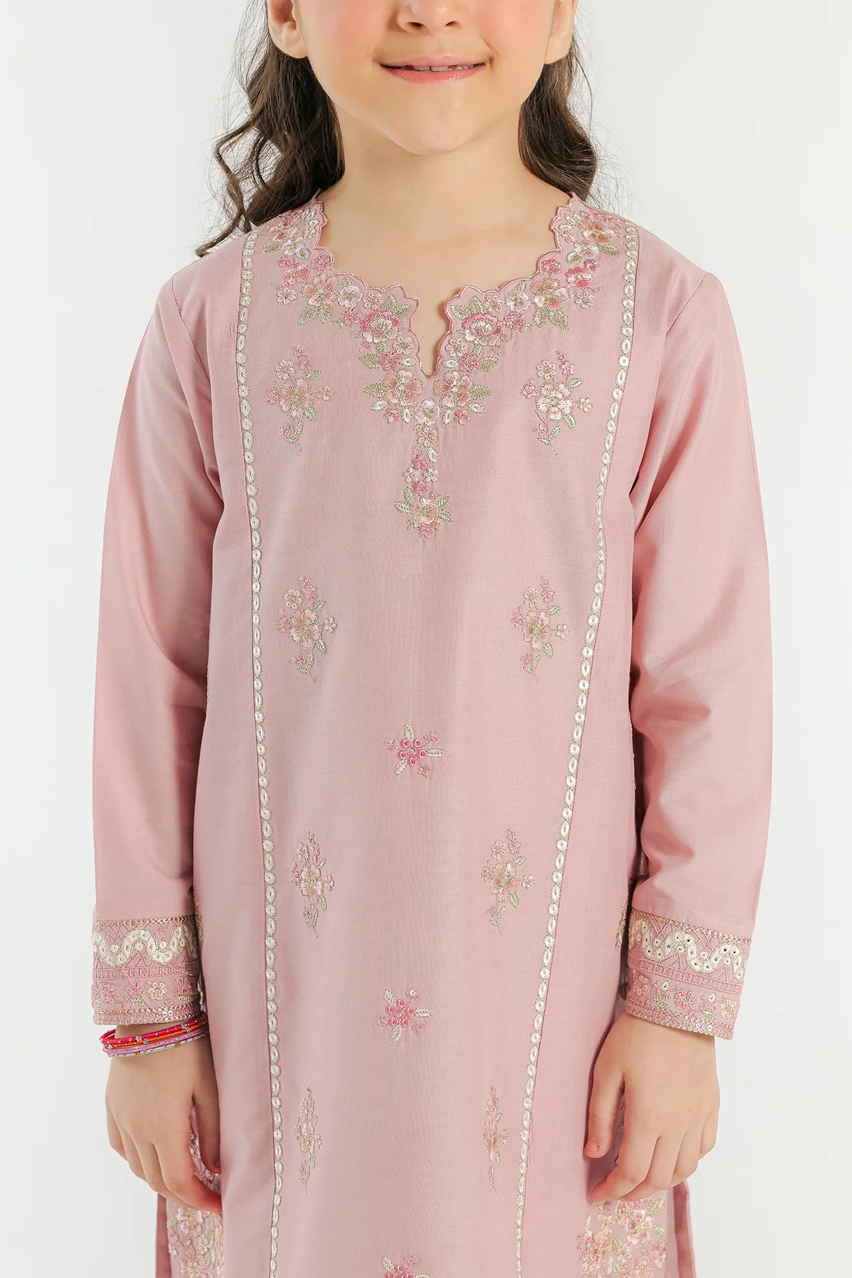 Detailed embroidery of Ethnic’s pale coral suit, highlighting fine craftsmanship – a premium embroidered outfit in Pakistani suits online Canada.