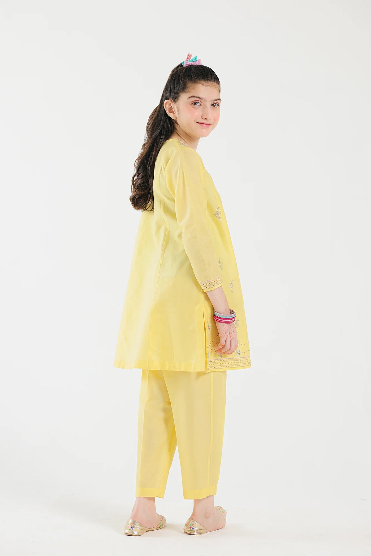 Pakistani suits for kids in Canada – Ethnic’s bright yellow embroidered lawn suit showcases delicate craftsmanship and a stylish fit.