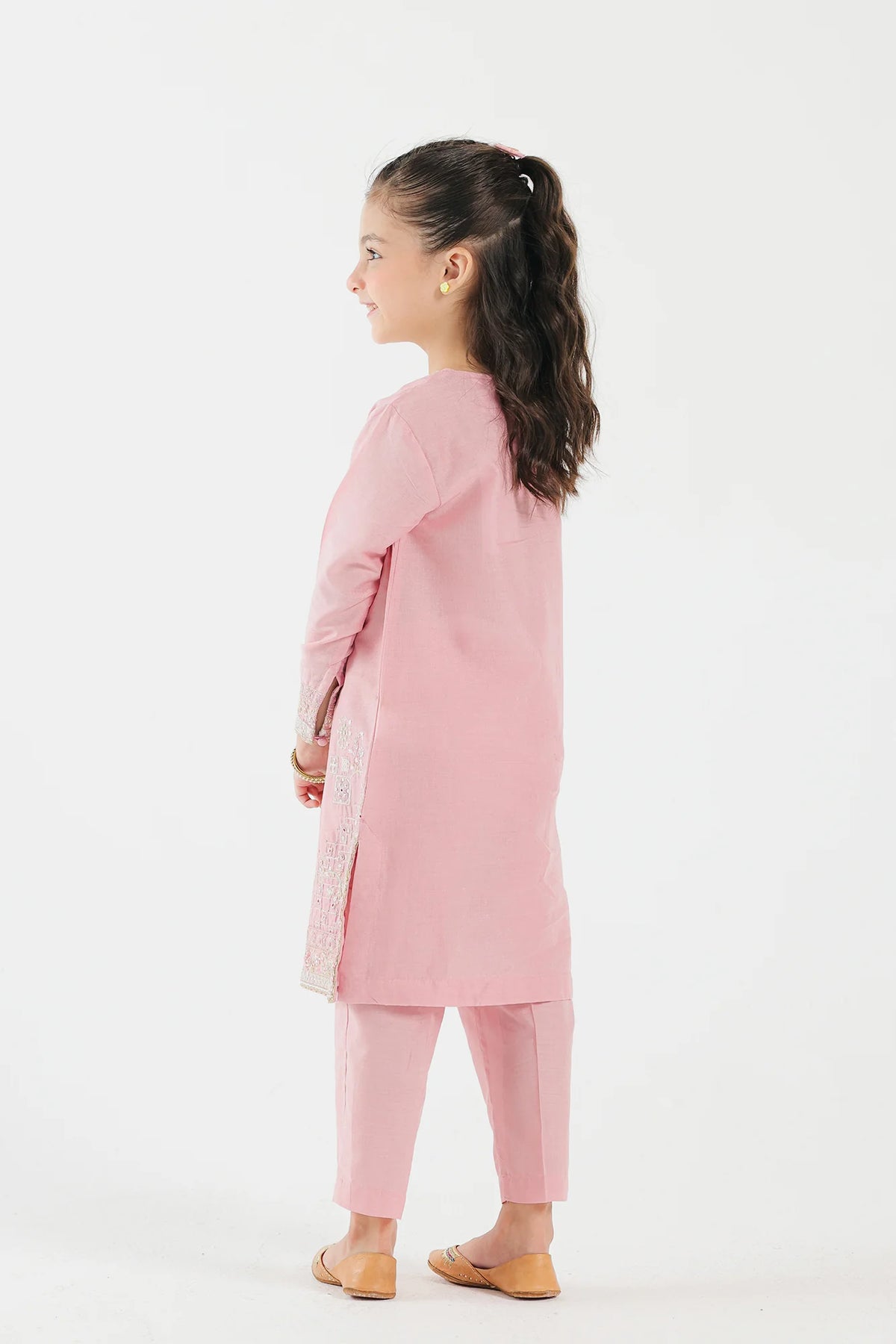 rear view of Ethnic pastel pink embroidered suit’s back design showcases elegant detailing, making it a perfect Pakistani suit for kids in Canada.
