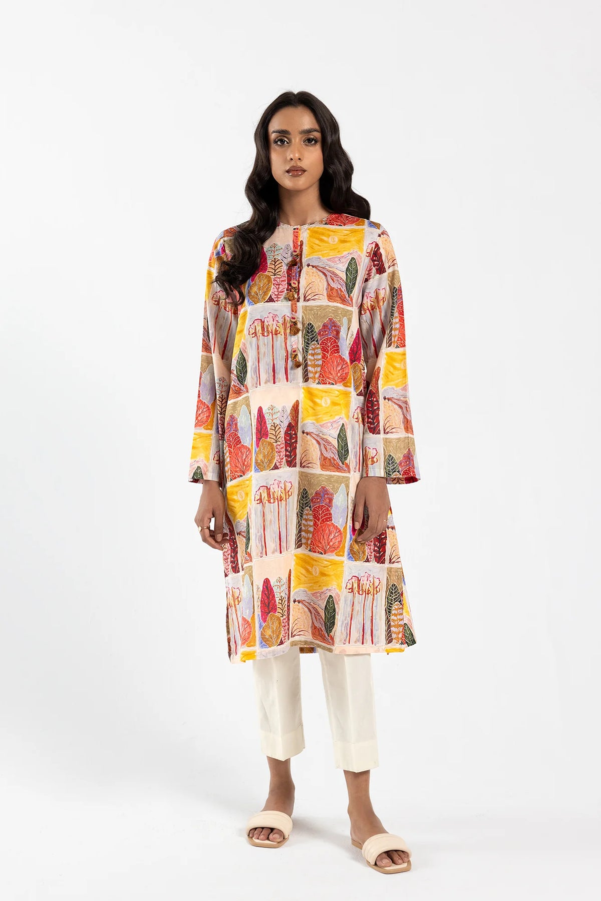 WOMEN WAERING Ethnic pale yellow printed lawn kurta – a stylish choice for Pakistani suits online in Canada, designed for casual wear.