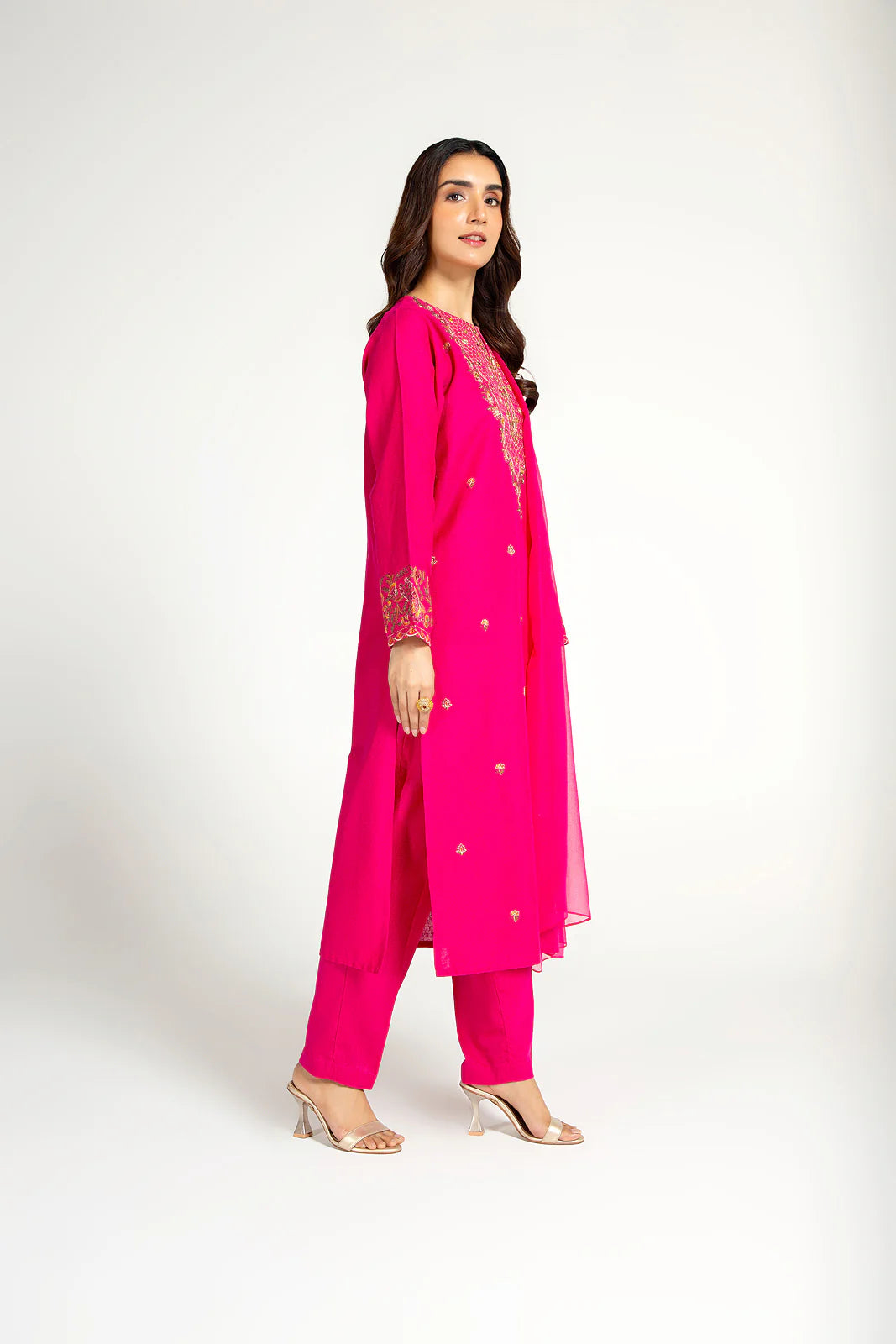 women showing side view of Pakistani suits in Canada with this Chinyere bright pink cotton karandi 3PC suit, perfect for casual occasions.