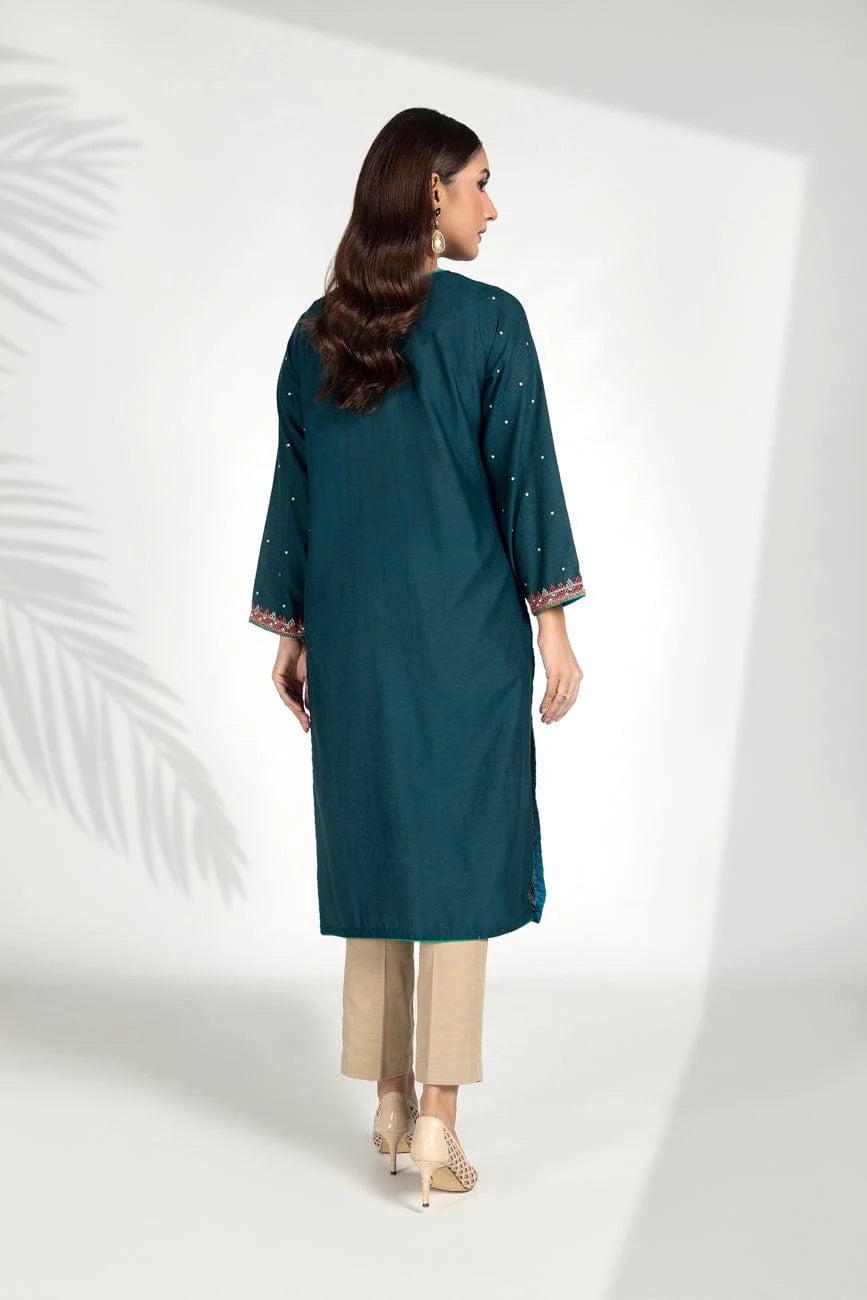 Back view of Chinyere’s Japanese Indigo lawn suit, a sophisticated option for those looking for traditional Pakistani clothes.