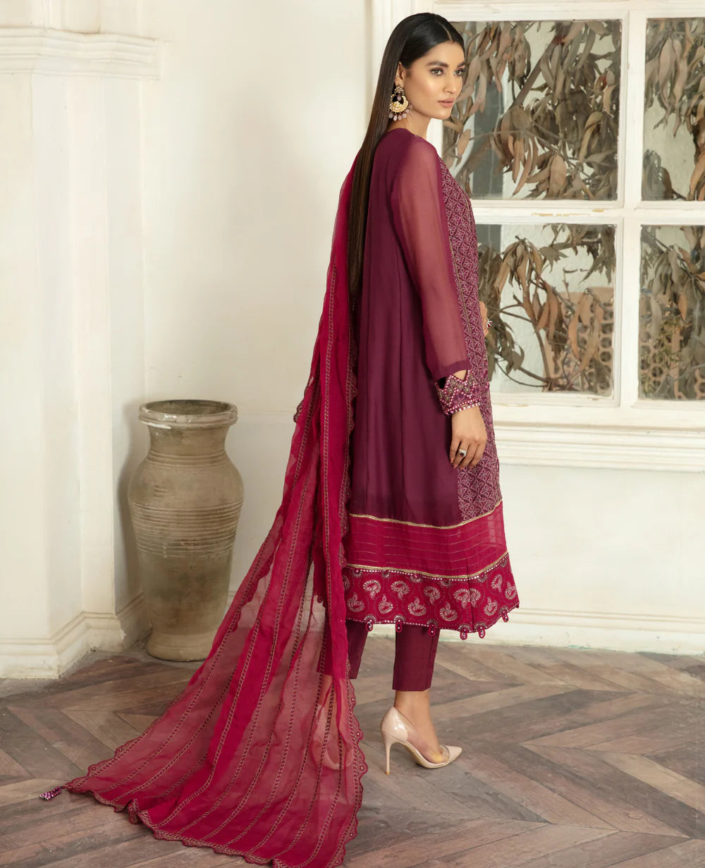 Rear view of Xenia’s embroidered chiffon gown, a stylish 3PC outfit in the latest Pakistani suits collection.