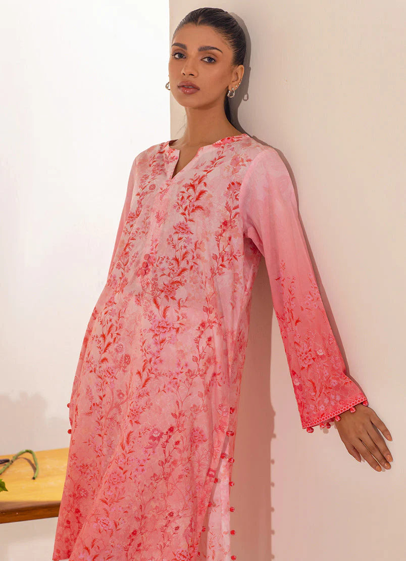 Close-up of the floral motifs and beadwork on this peach kurta, highlighting premium Pakistani suits for women.
