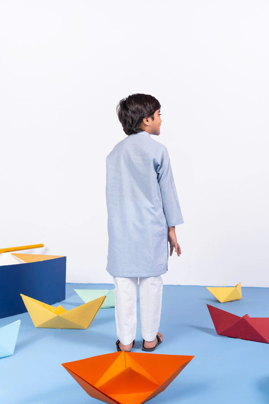 Pakistani top designers for kids in Canada- Brand Alkaram dyed yarn shirt with a regular fit for children.