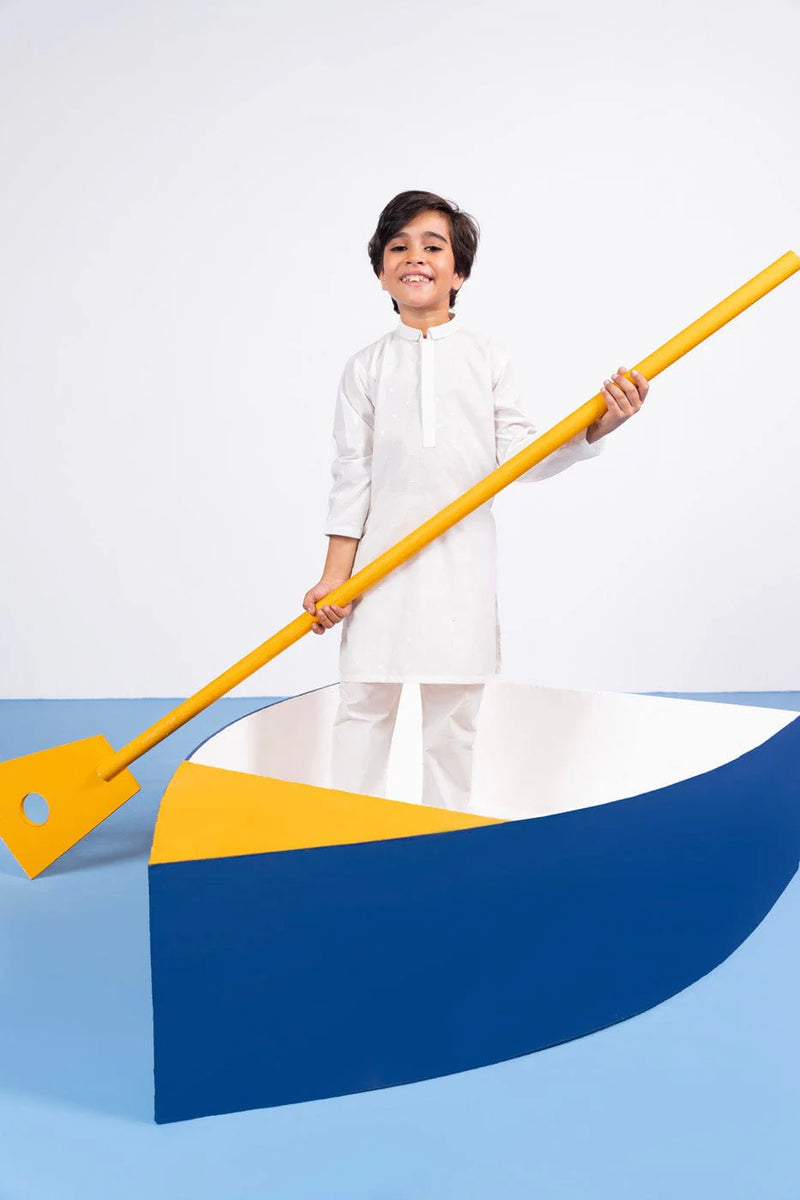 Side profile of Alkaram’s white karandi shirt for boys, a great option for Pakistani suits Canada for kids.