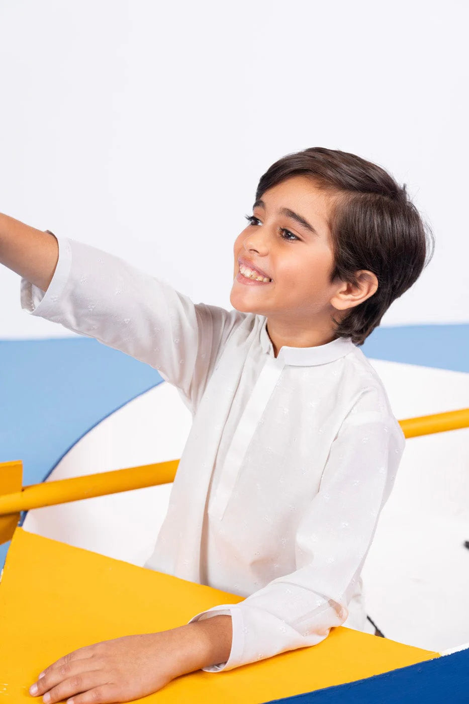 Soft karandi dyed yarn shirt by Alkaram – ideal casual wear for boys. Find the best Punjabi suits for kids here.