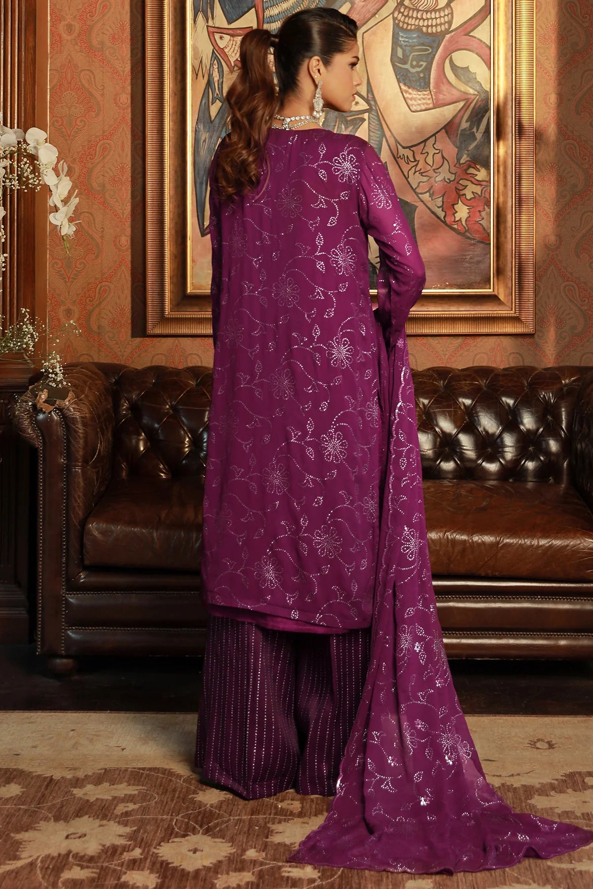 A REAR view of Kayseria’s embroidered chiffon suit, showcasing detailed threadwork – an elegant choice for Punjabi suits in Canada