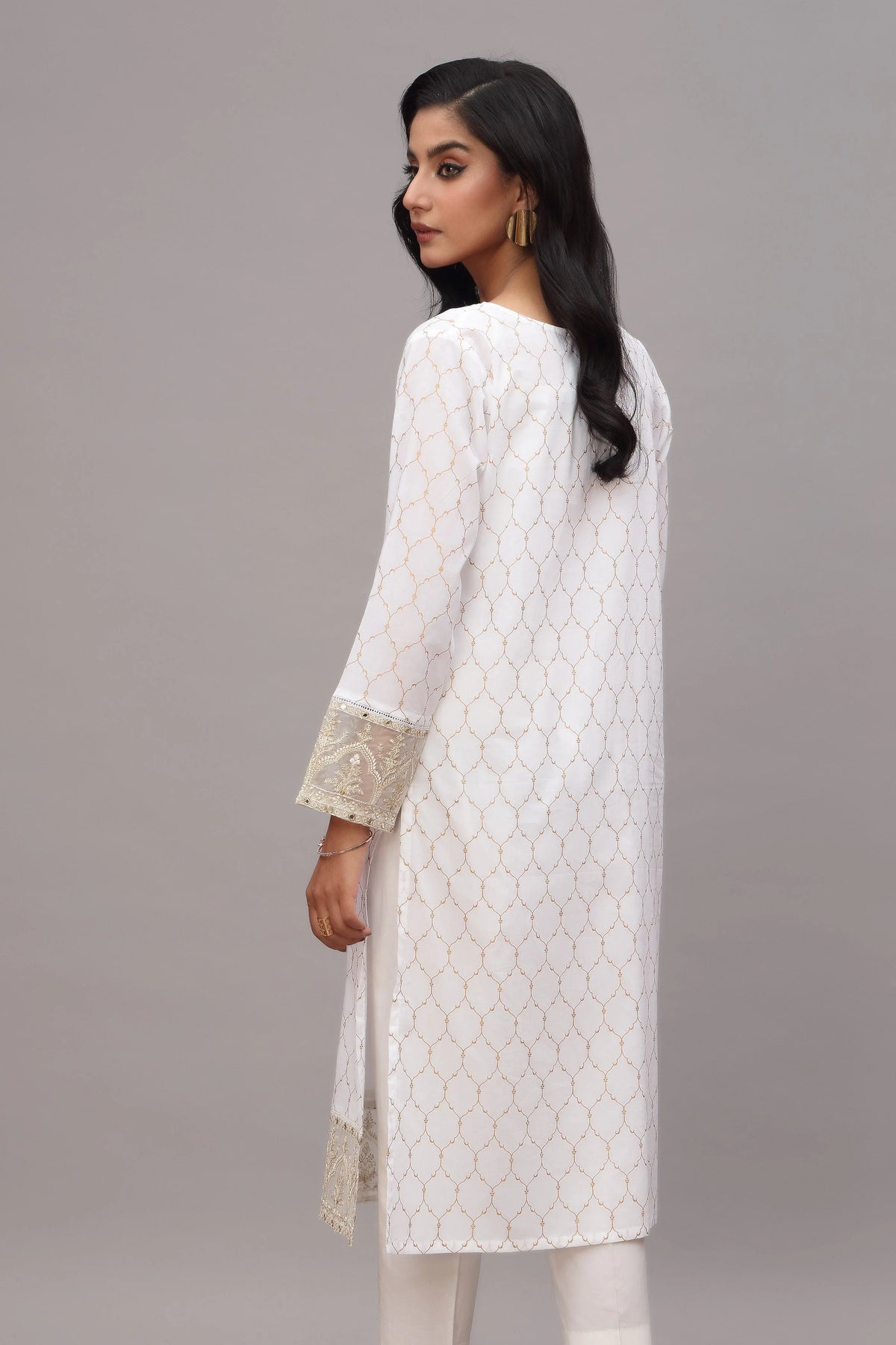 Rear view of the white printed lawn shirt by Chinyere, a lightweight and breathable option for Pakistani suits online in Canada.
