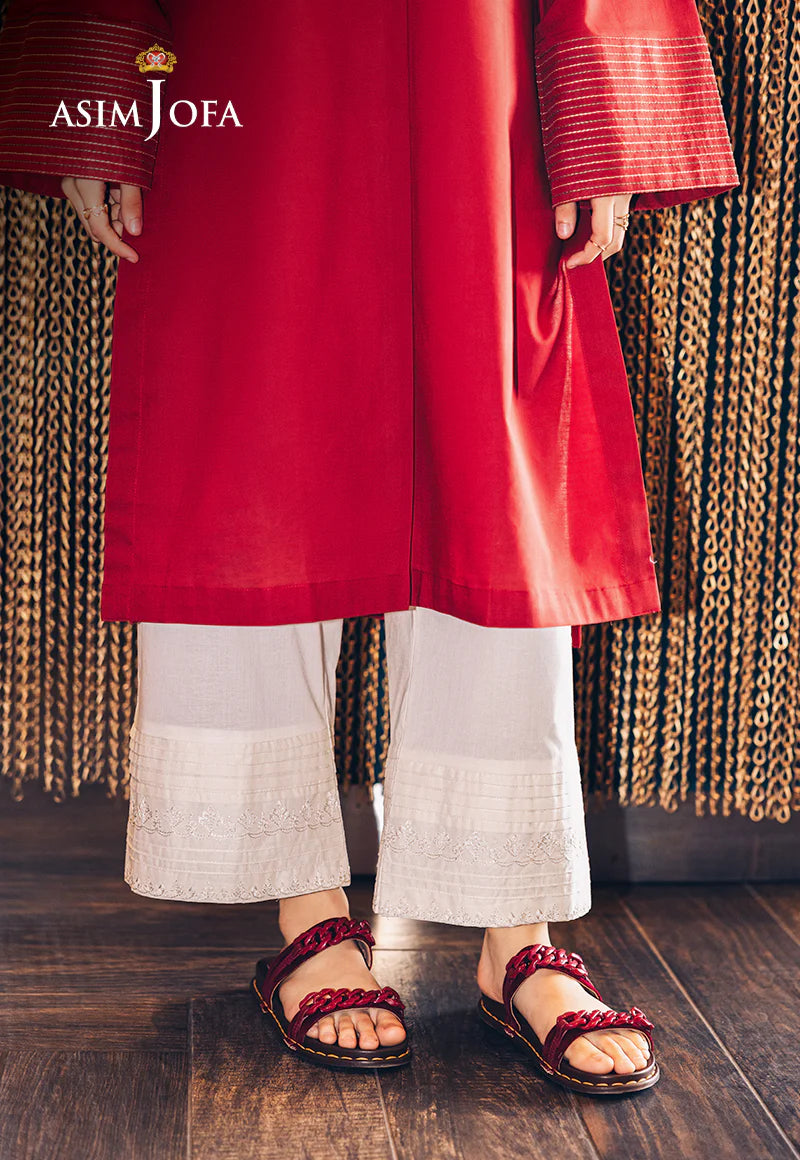 WOMEN WEARING TROISER OF Asim Jofa off-white cambric trouser – a stylish pick for Pakistani suits online in Canada, crafted with premium cambric cotton.