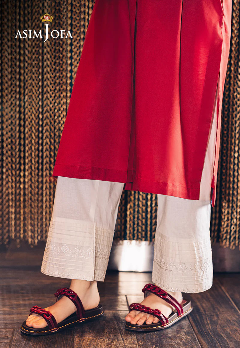 Side profile of Asim Jofa’s off-white cambric trouser, offering a refined look for Pakistani suits in Canada.