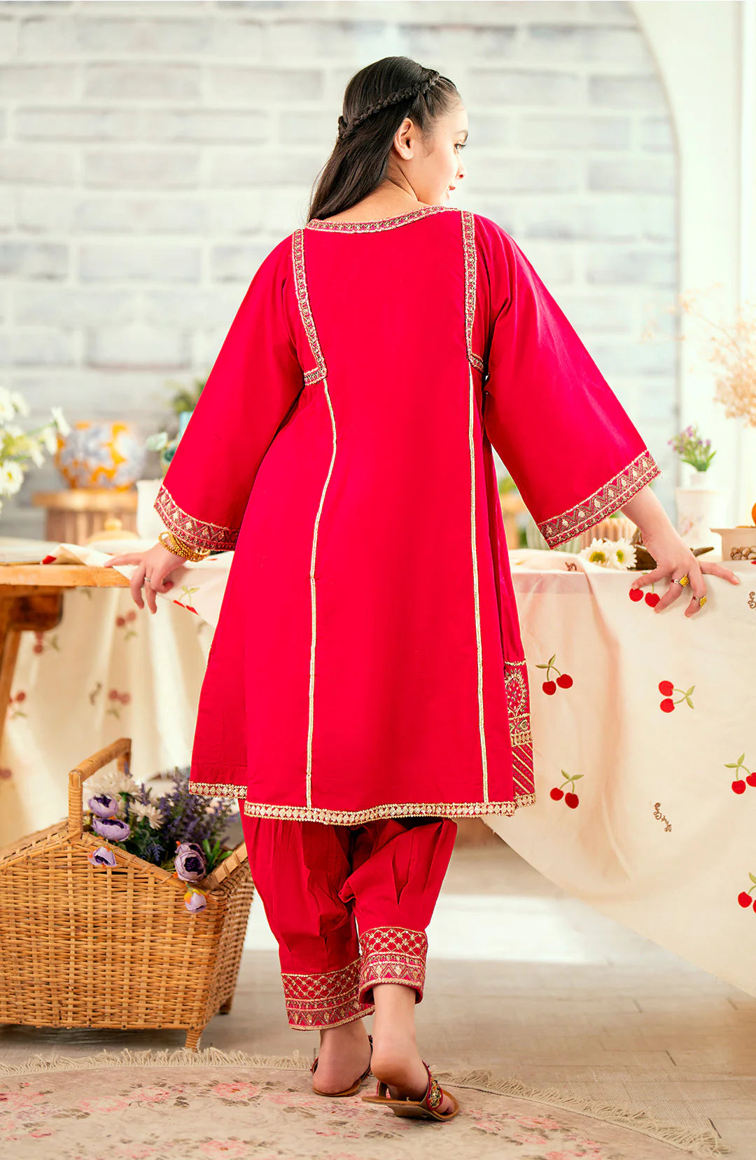 Back view of Maryum & Maria’s pink peacock embroidered suit, highlighting intricate threadwork – a premium choice for Pakistani suits Canada.