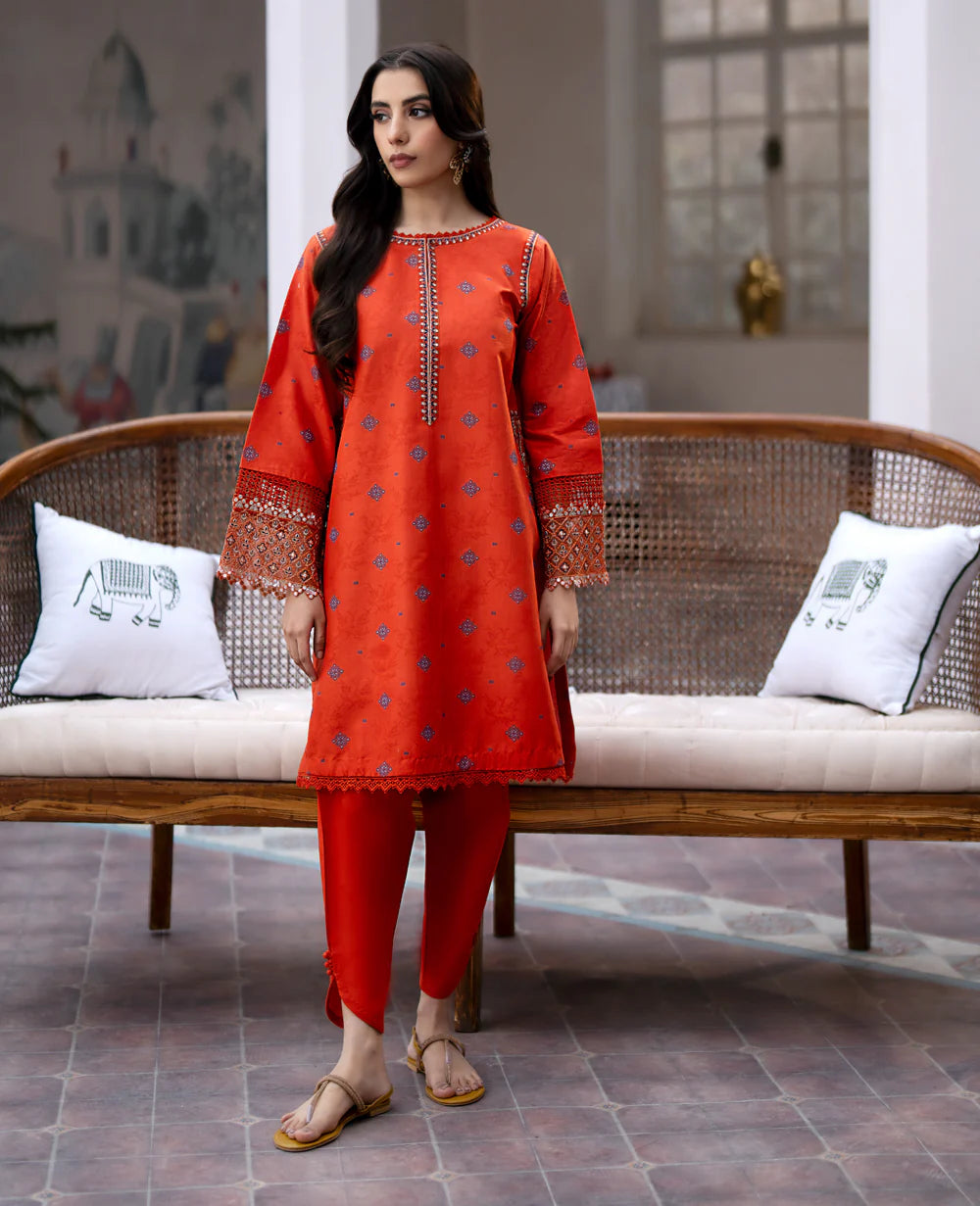 women standing showing Xenia Terre Lawn Jacquard Embroidered Suit – a refined choice for Pakistani suits online in Canada, crafted with premium lawn fabric.