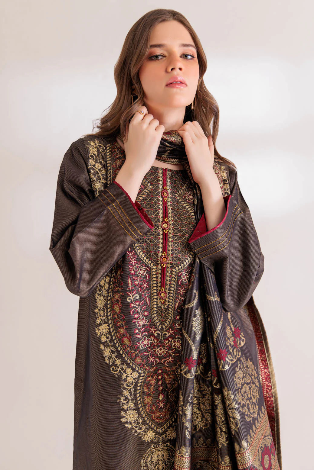 women showing Close-up of the fine Maisuri embroidery on Bonanza Satrangi’s black 3PC suit – luxury Pakistani suits in Canada.