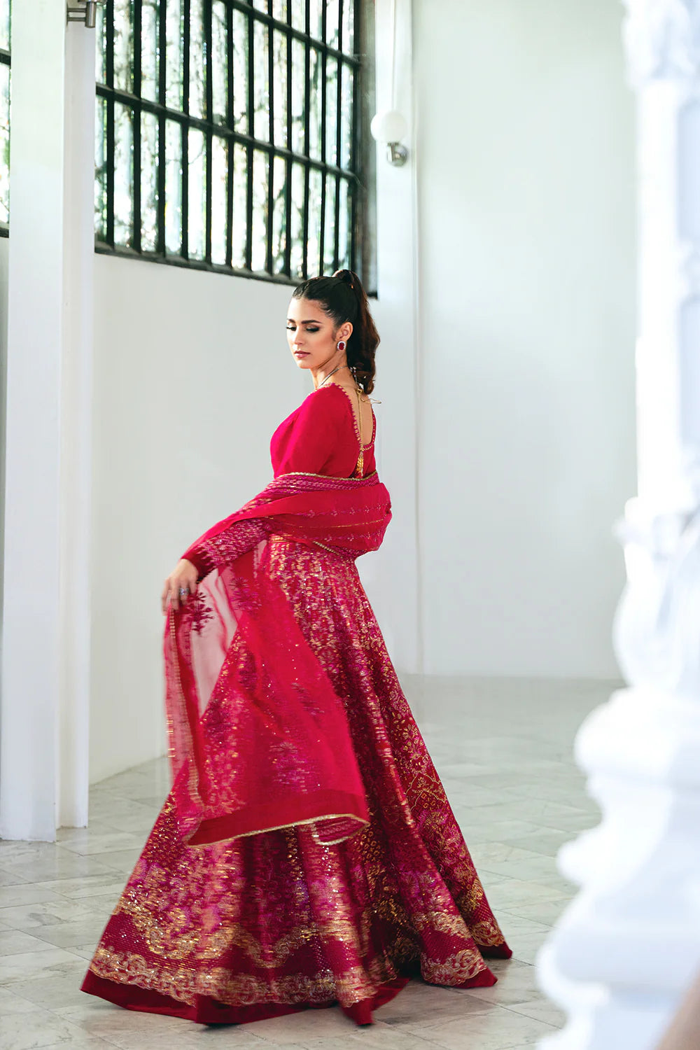 Saira Rizwan designer bridal lehenga back view - fuchsia pink Korean silk choli with organza dupatta - Pakistani wedding dress online Canada.