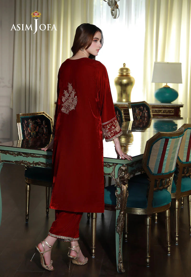 Back view of Asim Jofa’s deep blood red velvet 2PC suit for women, featuring intricate embroidery – traditional Pakistani clothes perfect for Canada.
