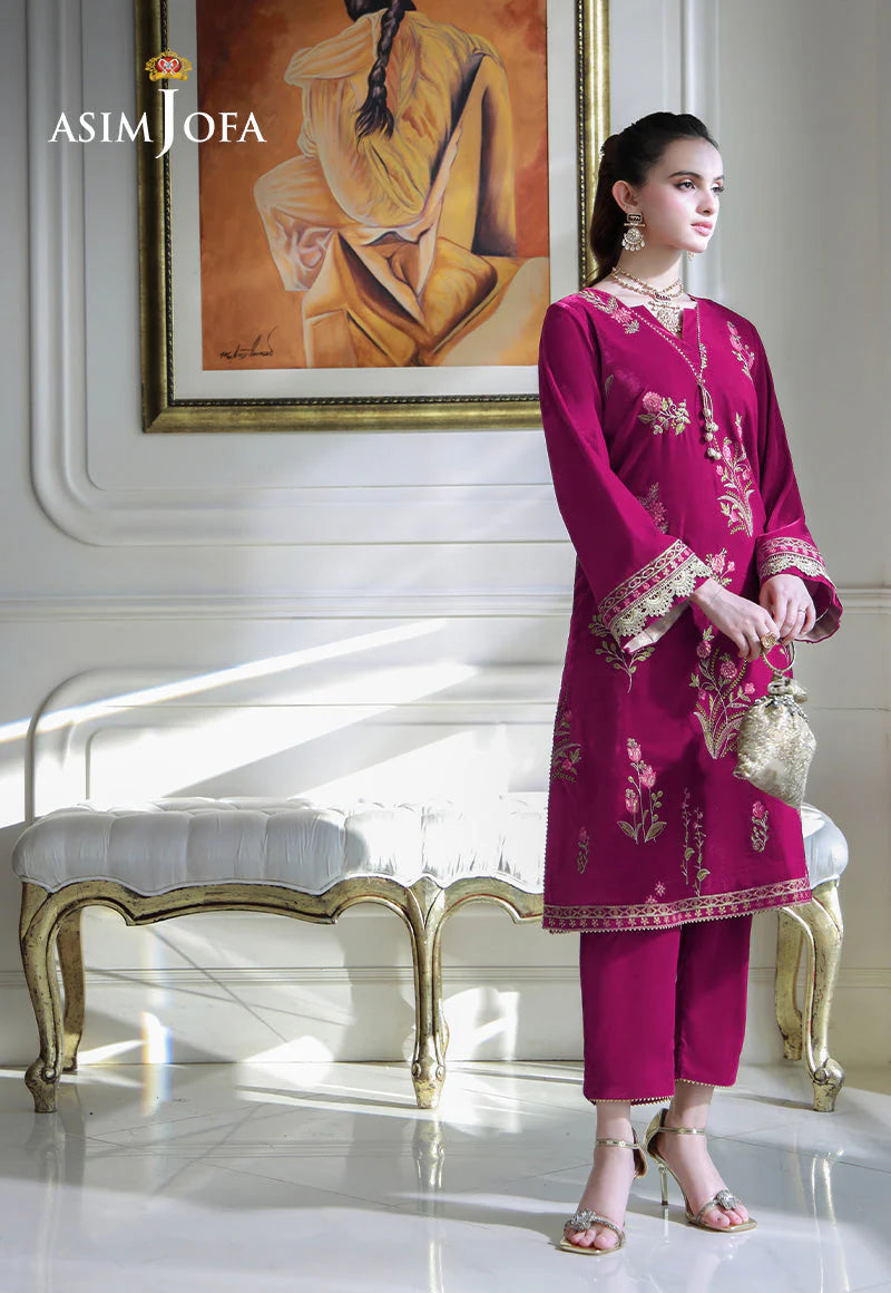 Elegant magenta velvet suit from Asim Jofa – showcasing traditional Pakistani clothes and stylish Punjabi suits