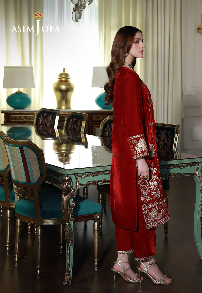 Right side closeup of Asim Jofa's blood red velvet 2-piece, a luxurious Pakistani suits Canada option – model wearing medium.