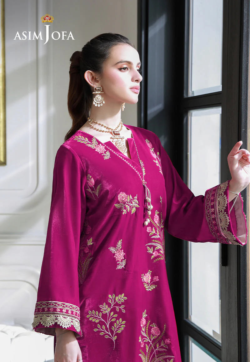 right view of Asim Jofa’s embroidered magenta velvet suit – a standout piece among Pakistani suits Canada collections.