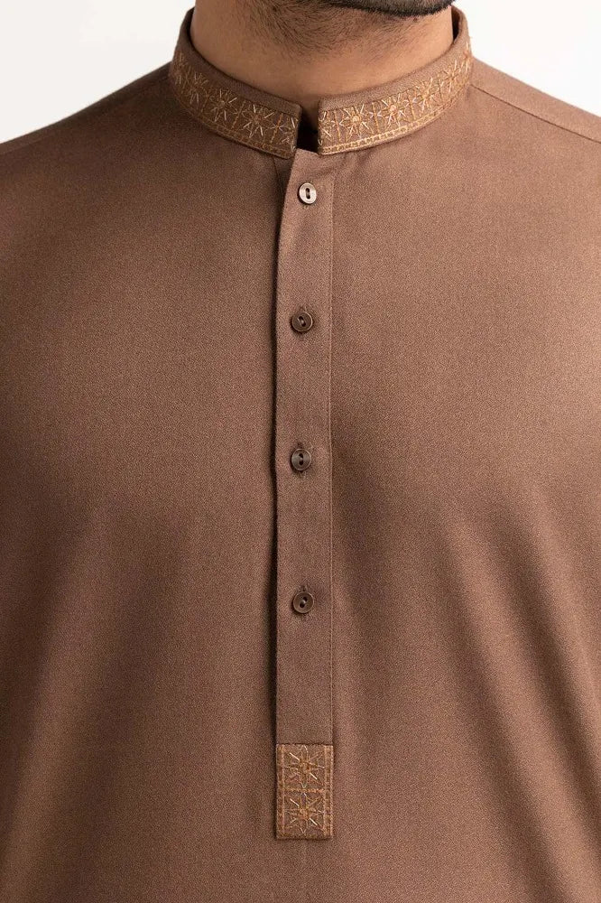 Detailed embroidery of GulAhmed’s brown suit, highlighting its premium craftsmanship – a must-have Pakistani suit for men in Canada.