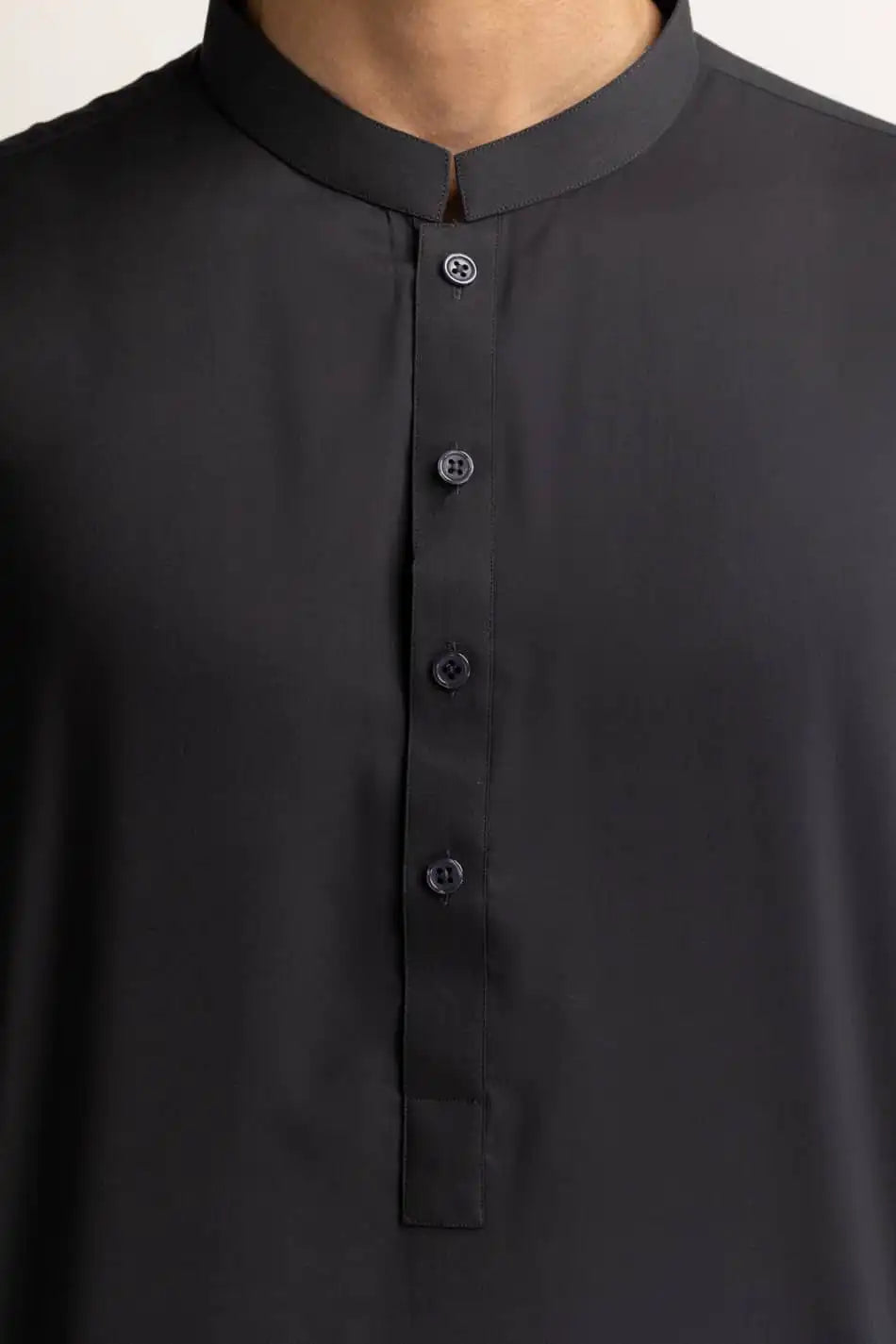 Detailed texture of GulAhmed’s charcoal suit, highlighting its premium blended fabric – a must-have Pakistani suit for men in Canada.