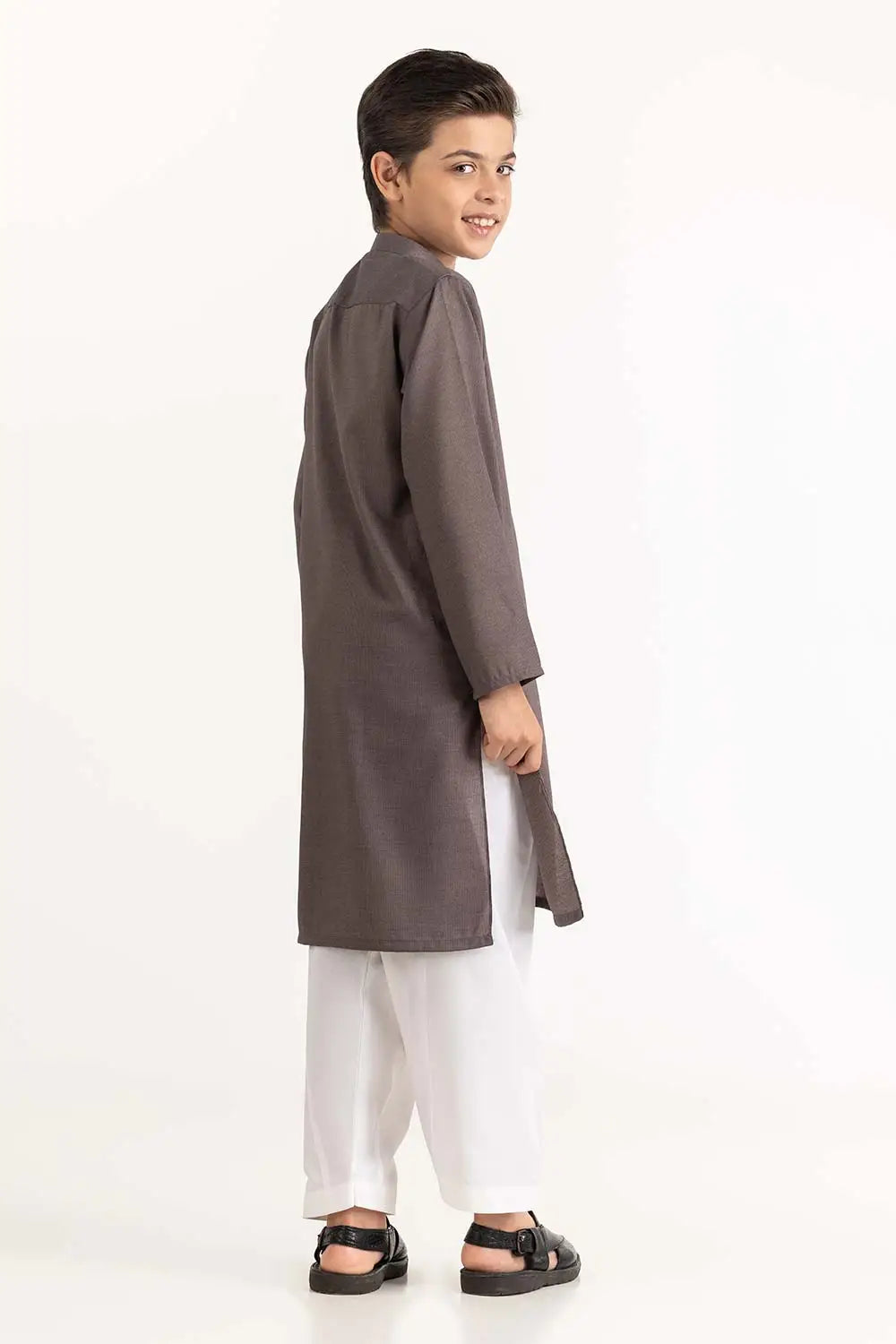 Detailed close-up of the premium blended fabric on GulAhmed’s grey boys’ kurta, ensuring a comfortable fit.