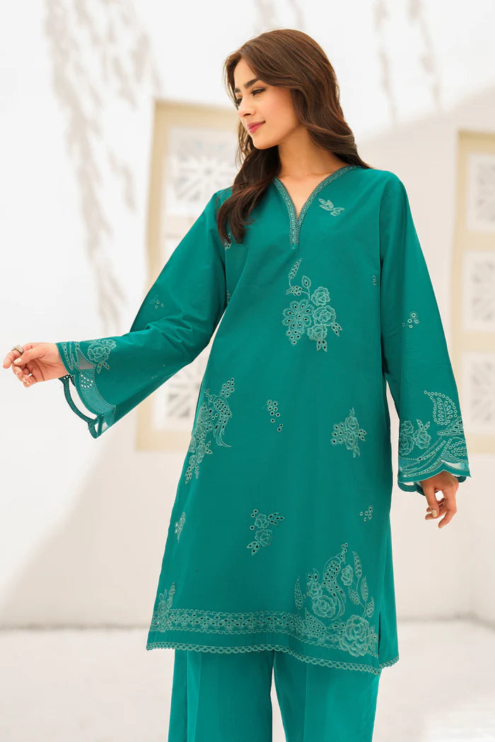 Elegant teal embroidered Pakistani suit with intricate paisley and floral motifs, featuring detailed sleeve embellishments and traditional neckline