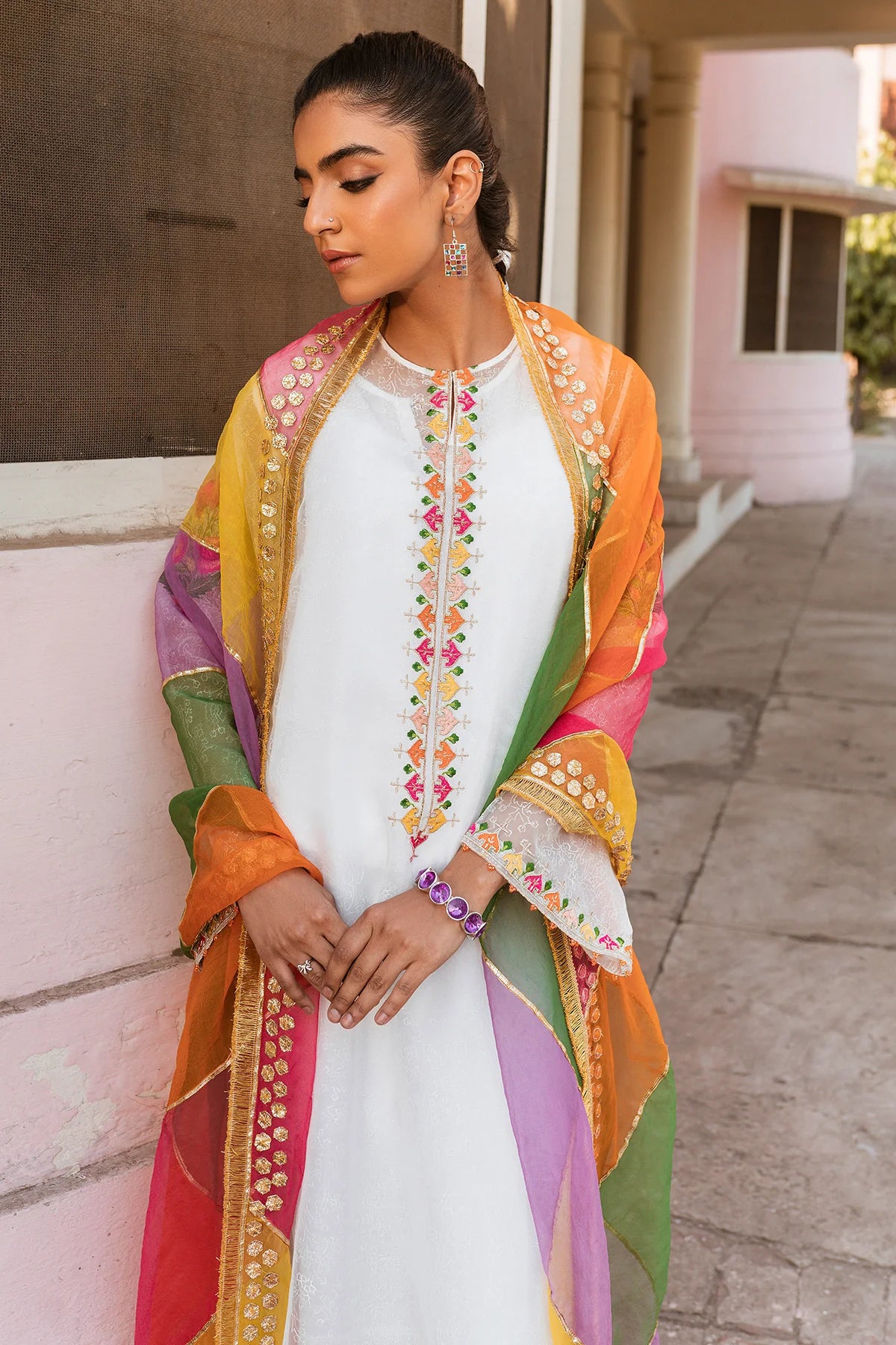 Shop Punjabi suits in Canada with this elegant white 4PC synthetic organza suit from Keyseria, featuring intricate embroidery and block prints.