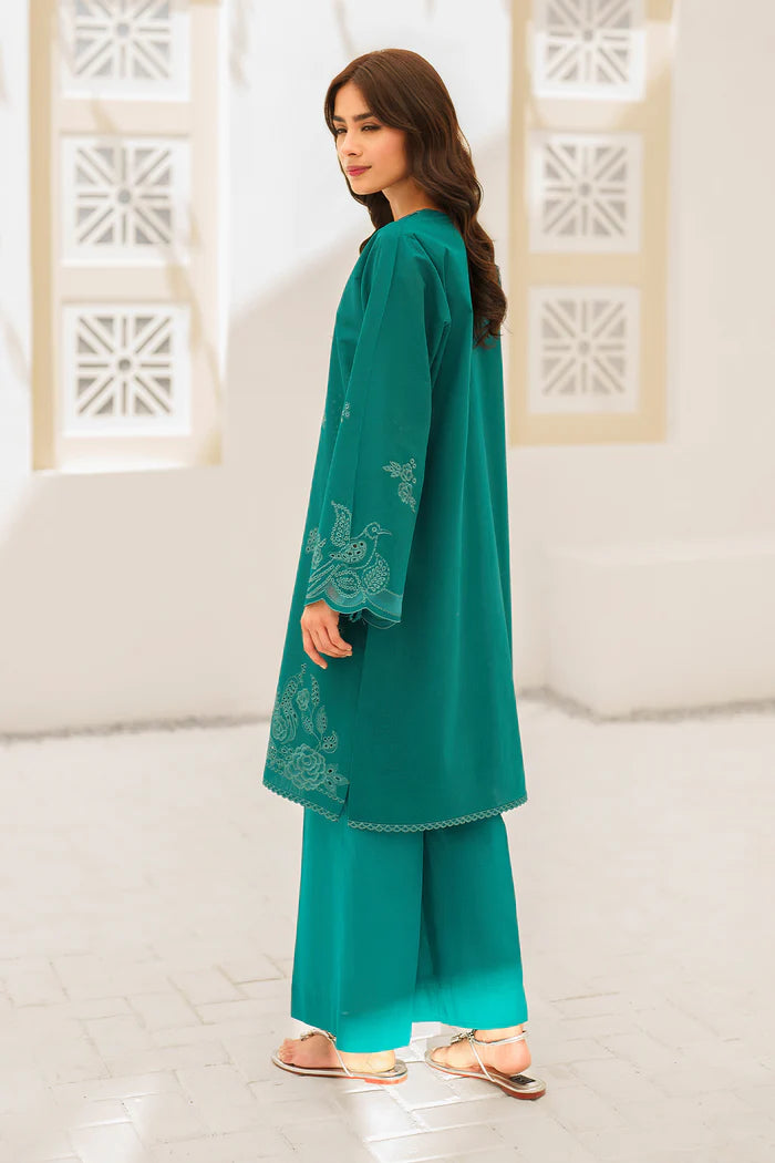 Back view of teal Pakistani formal wear with delicate embroidery, flowing sleeves, and matching straight pants for festive occasions