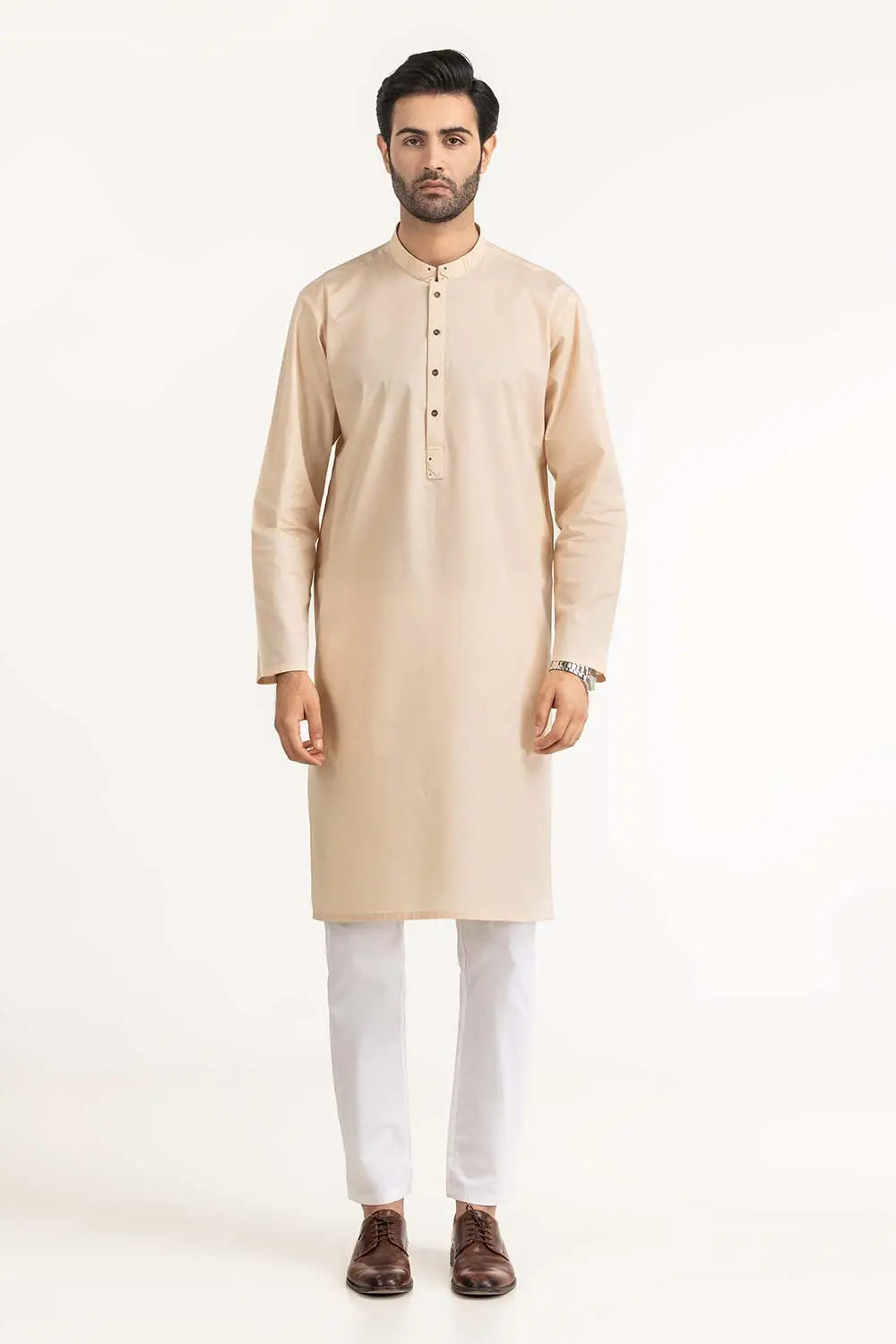 main standing straight wearing GulAhmed vanilla cotton kurta for men – a premium Pakistani suit, ideal for traditional and formal wear in Canada.