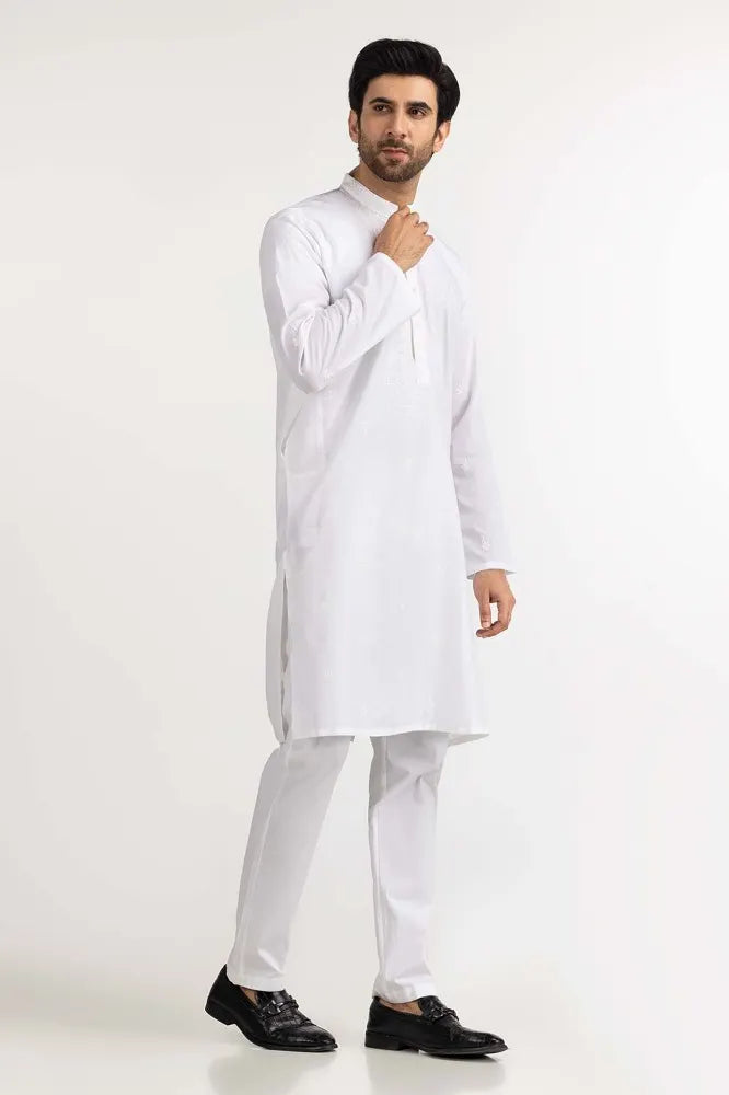 man standing view of Gulahmed's white cotton kurta – a refined Pakistani suit for men, ideal for formal and festive wear in Canada.