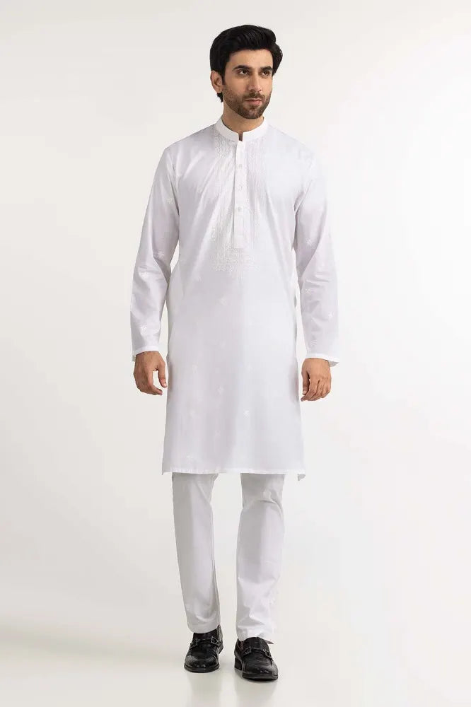 Soft cotton fabric of Gulahmed's white embroidered kurta, ensuring comfort and style in Pakistani suits Canada.