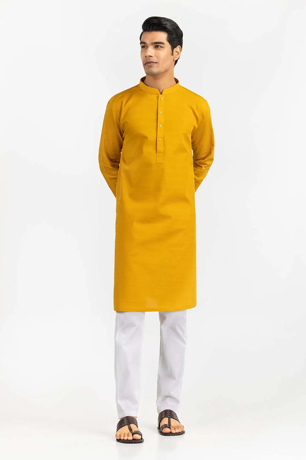experience the perfect fit with this yellow cotton kurta from Gulahmed. A must-have for Punjabi suits lovers in Canada.