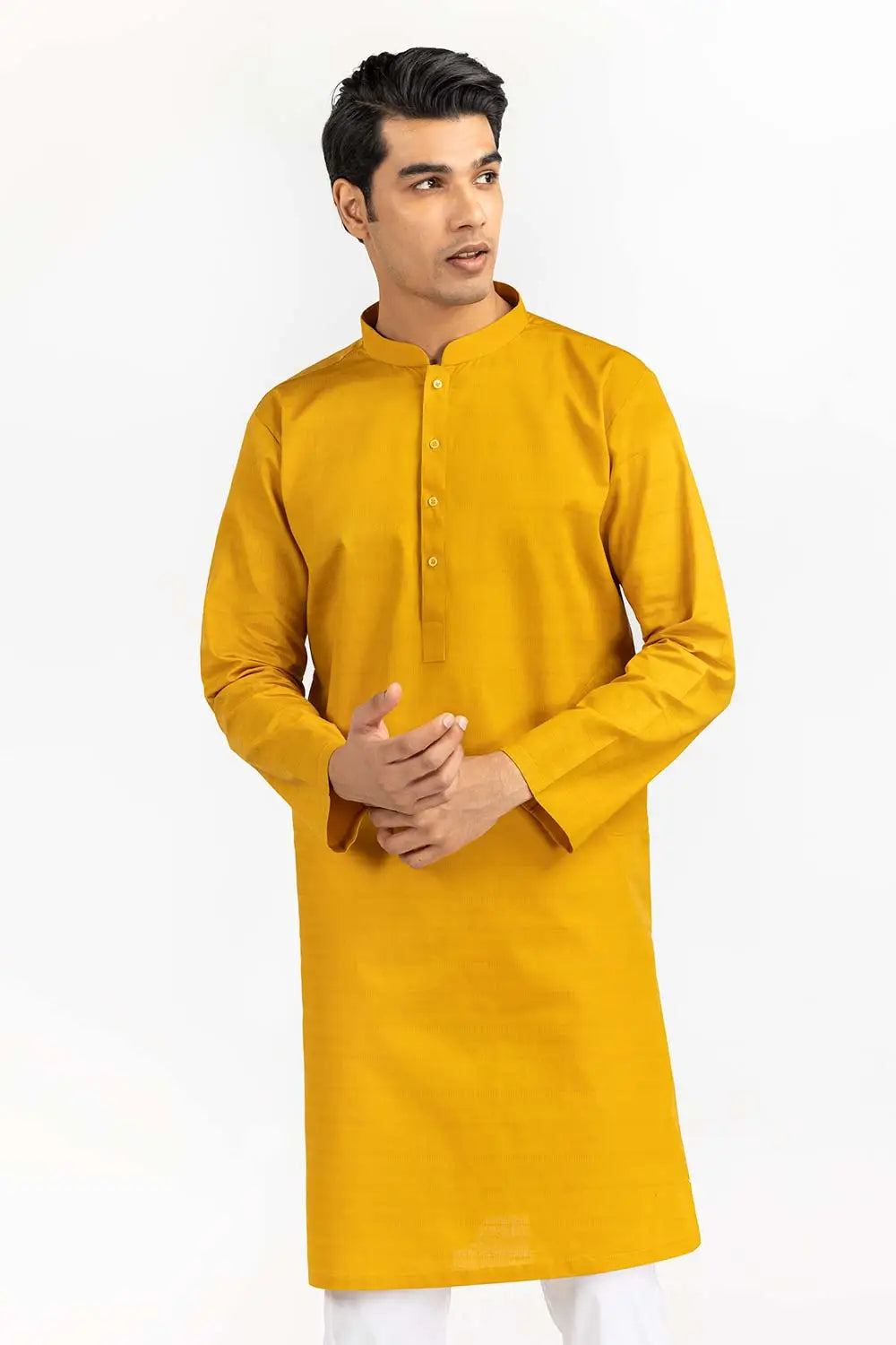 front profile of the Gulahmed yellow kurta – a timeless piece in Pakistani suits in Canada for men. Designed for casual wear.