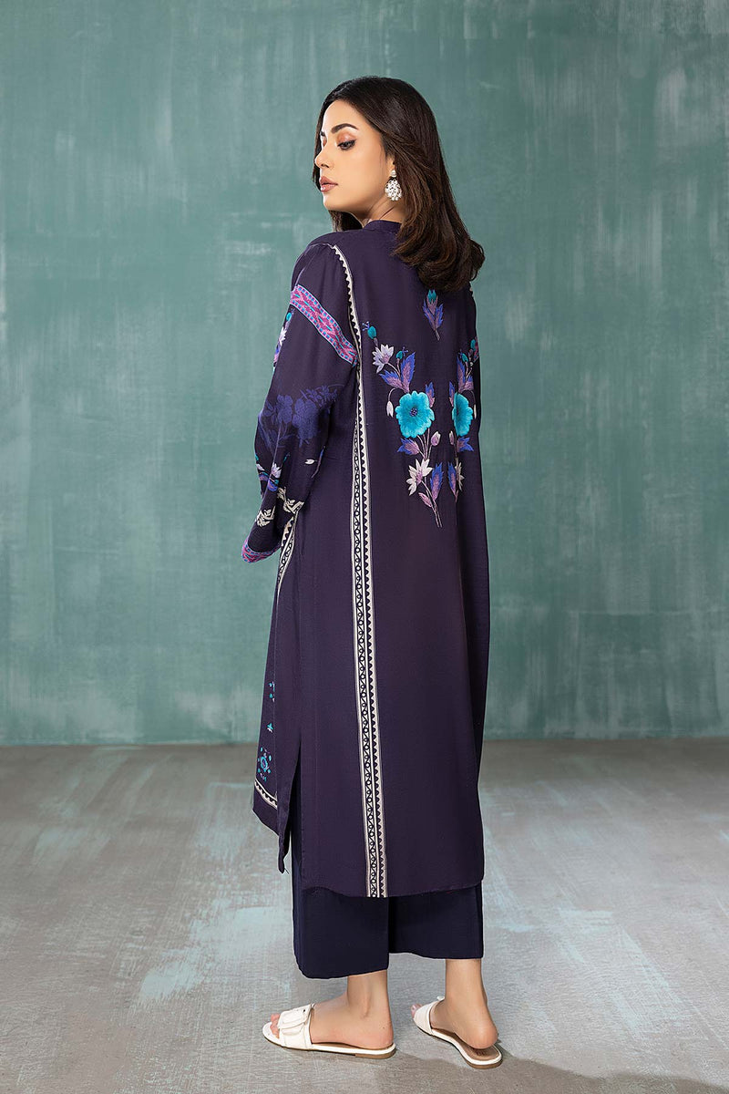 women showing the Back view of Charizma’s navy blue lawn shirt – perfect for casual Pakistani suits in Canada, combining elegance and comfort.