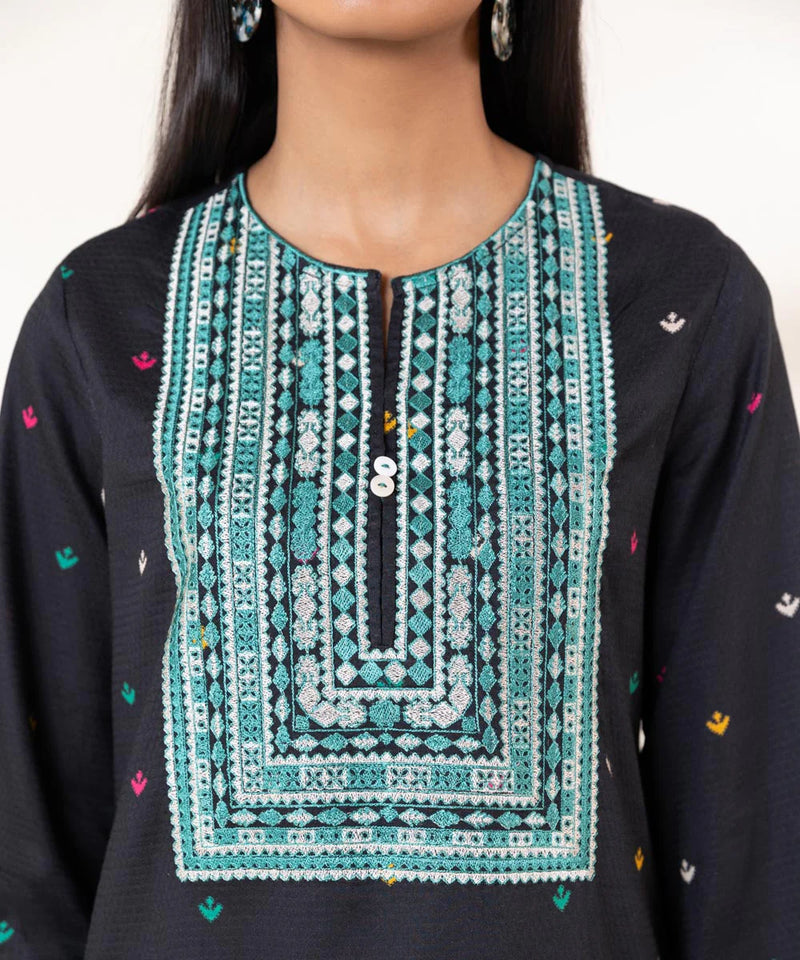 Shop Pakistani suits in Canada with this elegant black embroidered dobby shirt from Sapphire, featuring intricate craftsmanship.