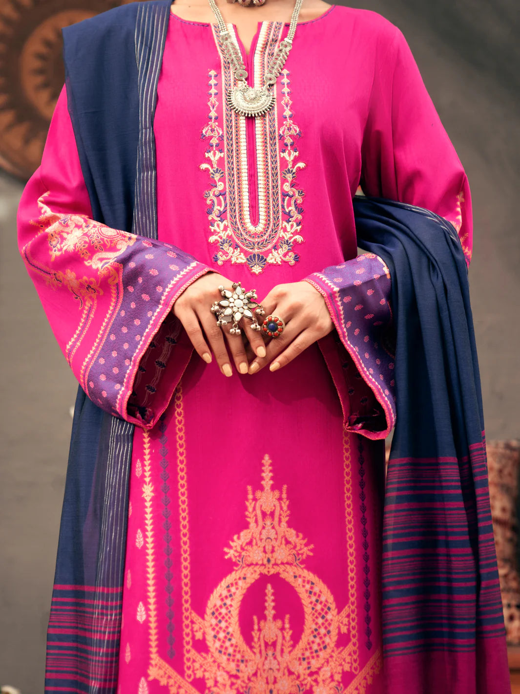 Detailed embroidery of Almirah’s pink jacquard suit, crafted with precision – shop premium Punjabi suits in Canada today.