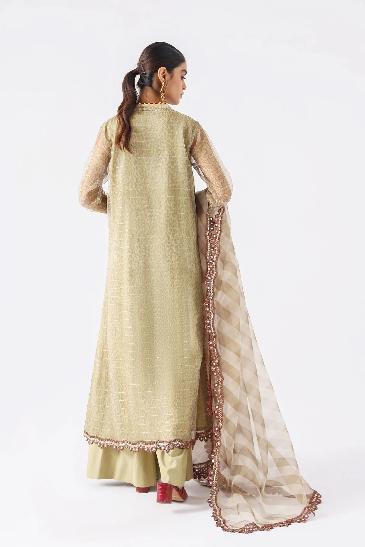 Back view of Charizma’s sea green zari net suit – a graceful outfit available for Pakistani suits online in Canada.